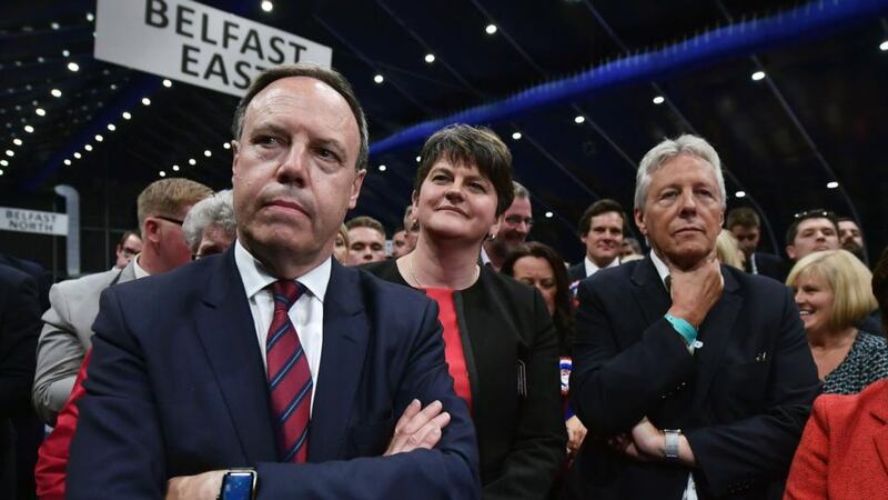 Nigel Dodds, Arlene Foster and Peter Robinson: the British media is now awash with descriptions of DUP homophobia, creationism and climate-change denial. Photograph: Charles McQuillan/Getty