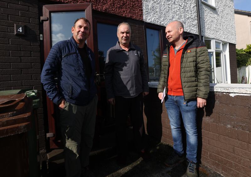 People Before Profit TD Gino Kenny, local resident Frank McLean and Kenny's party colleague Paul Murphy. McLean has lived in Fettercairn for more than 40 years. Photograph: Nick Bradshaw