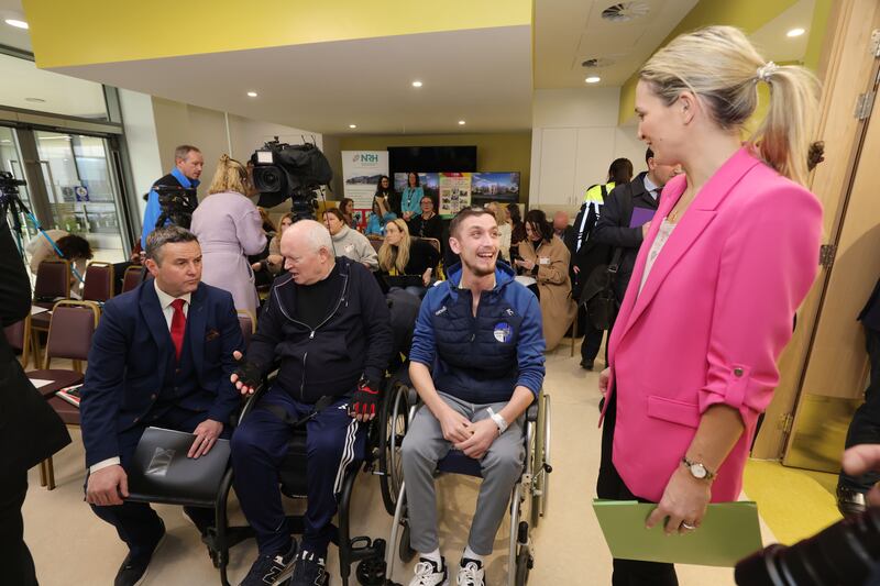 Road Safety Authority chief executive Sam Waide (left) speaks to patient Myles O’Brien, from Mayo, and Minister for Justice Helen McEntee meets patient Aaron Callan, from Co Louth, at the National Rehabilitation Hospital, Dún Laoghaire, at the launch of the Christmas  Road Safety Campaign. Photograph: Alan Betson 