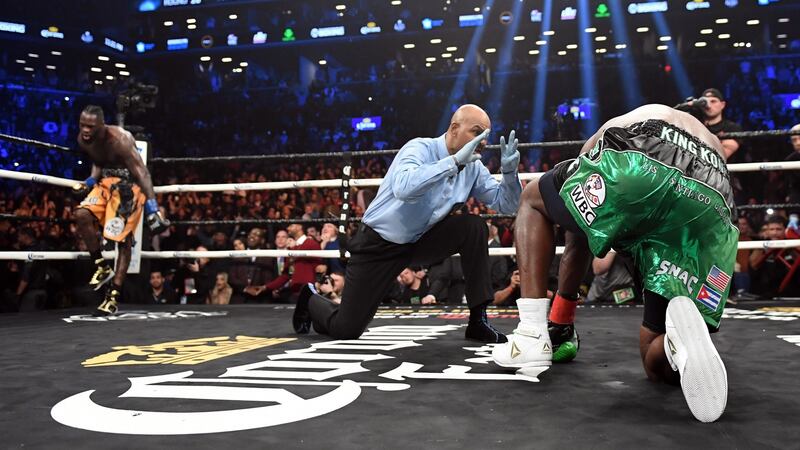 Luis Ortiz takes a count during his world heavyweight defeat to Deontay Wilder in New York. Photograph: Timothy A.Clary/AFP