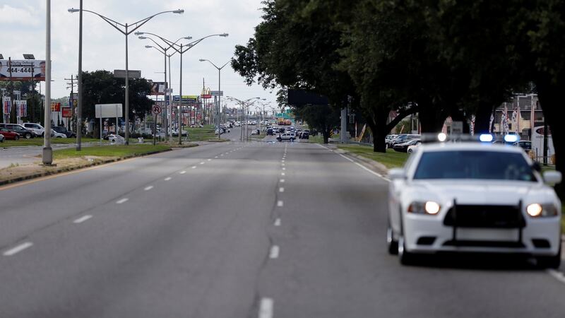 Police officers block off a road after a shooting of police in Baton Rouge, Louisiana, US. Photograph: Joe Penney/Reuters