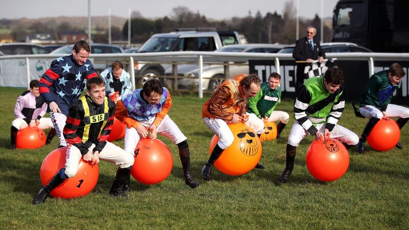 Jockeys compete in the space hopper derby at Plumpton. Photograph: Andrew Matthews/PA Wire