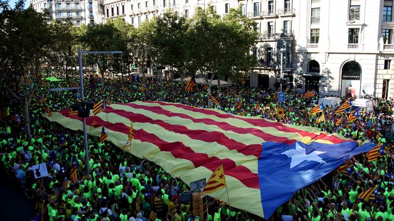 People march during a demonstration celebrating  Catalonia’s national day, in Barcelona, Spain. Photograph: Sandra Montanez/Getty Images