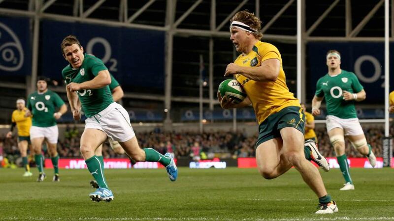 Australia’s Michael Hooper runs in their second try of the game. Photograph: Ryan Byrne/Inpho
