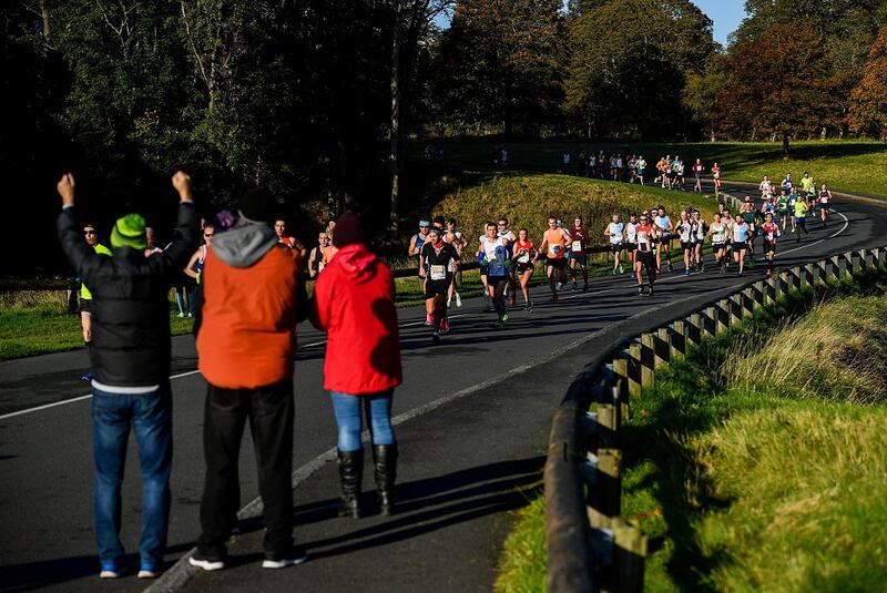 Spectators offer encouragement to the runners in Phoenix Park during 2019 Dublin Marathon. Photograph: Sam Barnes/Sportsfile