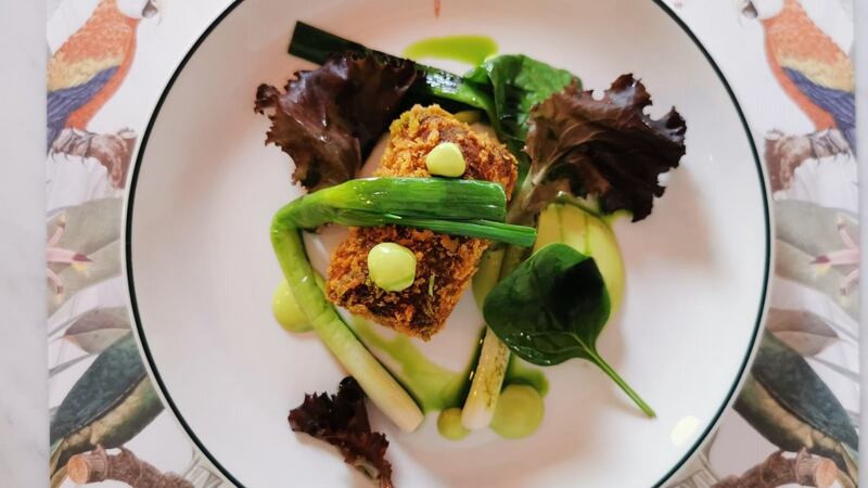 Duck croquette with scallion and leaves, €6.