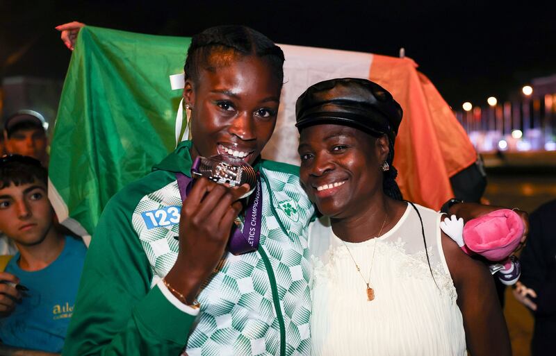 Ireland’s Rhasidat Adeleke celebrates receiving her silver medal with her mother, Adewumi Ademola, at Stadio Olimpico in Rome on Monday. 
Photograph: Morgan Treacy/Inpho