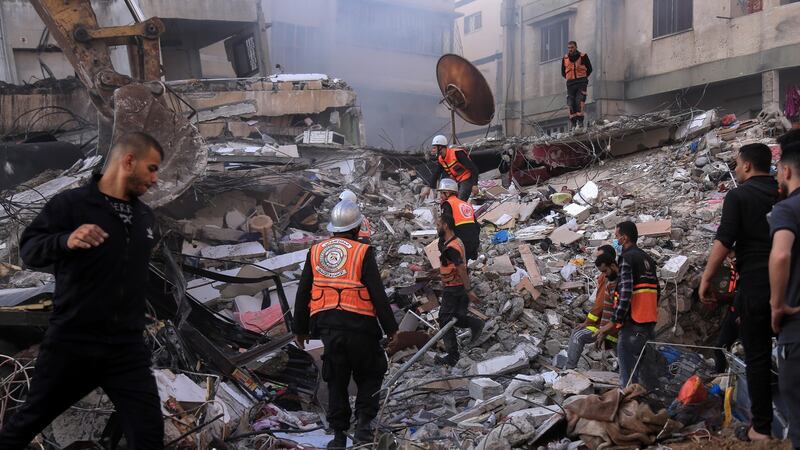 Rescue workers search for victims from the al-Qawlaq family after an Israeli air strike in Gaza City on May 16th. Photograph: Samar Abu Elouf/New York Times