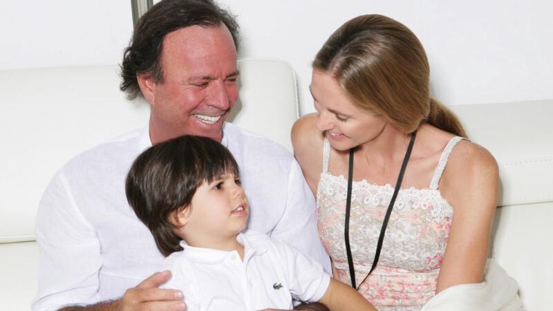 Iglesias with his wife, Miranda, and their fifth son, Guillermo