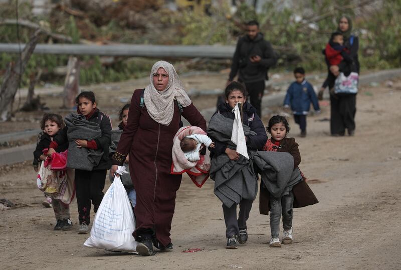 Palestinians travel from northern to southern Gaza during the November ceasefire. Photograph: Mohammed Saber/EPA