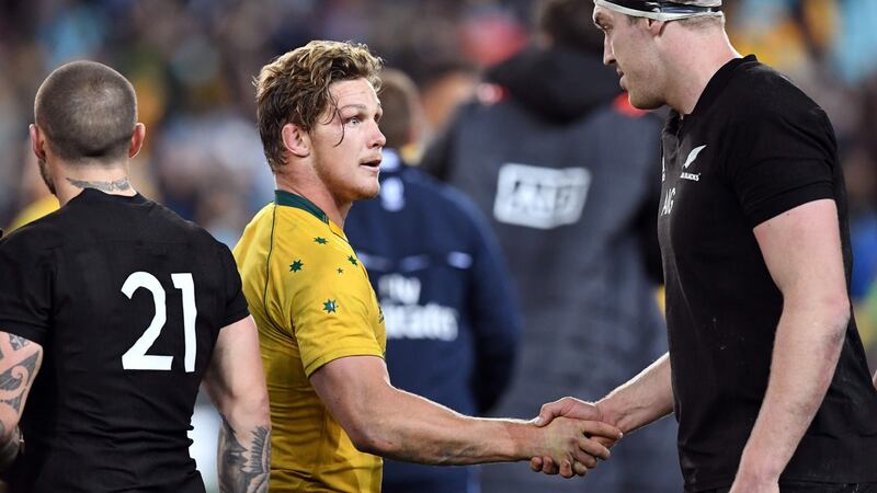 Australia captain Michael Hooper shakes hands with New Zealand’s Brodie Retallick after his side’s Rugby Championship tdefeat. Photograph: William West/AFP