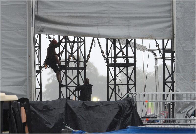 Workers take down the stage after the Swedish House Mafia concert in the Phoenix Park. Photograph: Dara Mac Dónaill