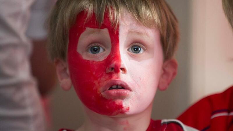 Briain Higgins (3) at Bishopstown GAA club during yesterday’s All-Ireland hurling final. Photograph: Provision