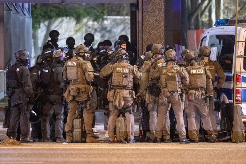 Armed police officers  at the scene of the shooting in Hamburg on Thursday. Photograph: News5/EPA