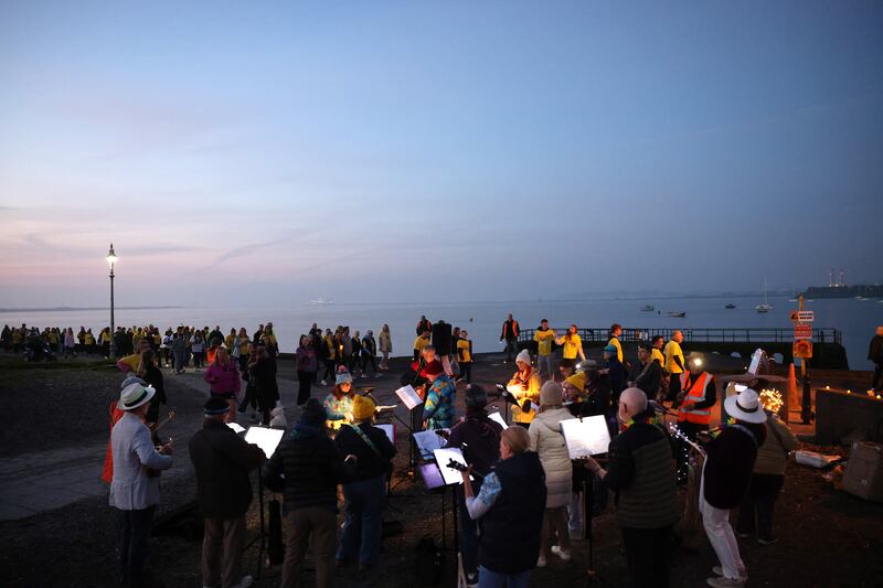 The Clontarf Ukulele Band entertain participants taking part in Darkness into Light 2024, in aid of Pieta, in Clontarf, Dublin. Photograph: Dara Mac Dónaill 