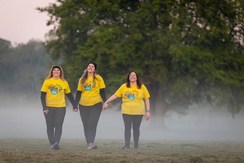Rosalie Downey, Jessica Swart and Tara Hatton during Darkness into Light in Malahide, Dublin. Photograph: Tom Honan/Inpho