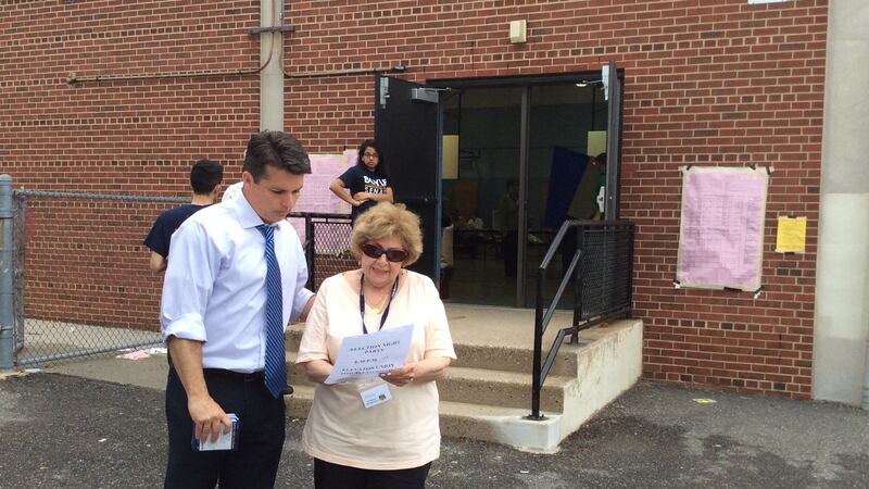US congressman Brendan Boyle handing out flyers for his brother Kevin Boyle, a Pennsylvania state representative running for the state senate, at a polling station in Bustleton, north Philadelphia, during Pennsylvania Democratic primary election on Tuesday. Photograph: Simon Carswell