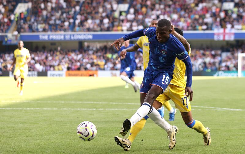 Nicolas Jackson of Chelsea is challenged by Nathaniel Clyne. Photograph: Ryan Pierse/Getty