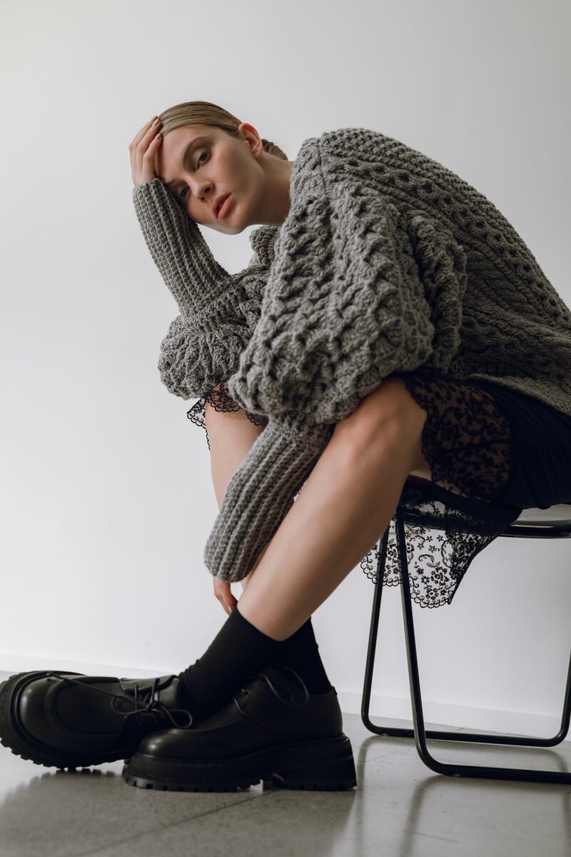 Handknit Aran crochet cardigan in greystone €1495, shoes by Marsell €695 Havana Boutique. Photographer: Tetyana Maryshko