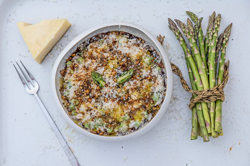 Asparagus and pea risotto with toasted hazelnuts and bonito vinegar dressing. Photograph: Harry Weir