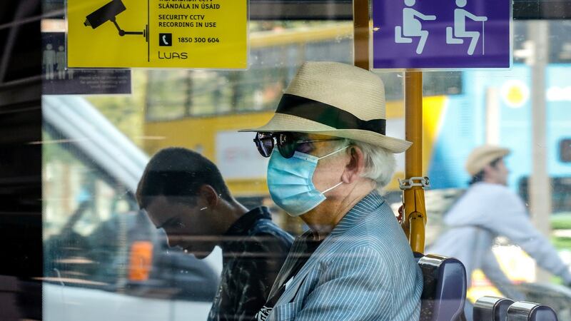 Recent statistics claim that about 41 per cent of Irish people are using face masks. Photograph: Crispin Rodwell/ The Irish Times