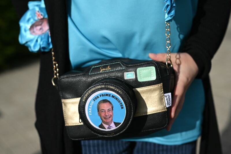 A delegate at the first day of the Reform UK party conference at the NEC Birmingham. Photograph: Oli Scarff/AFP via Getty Images         