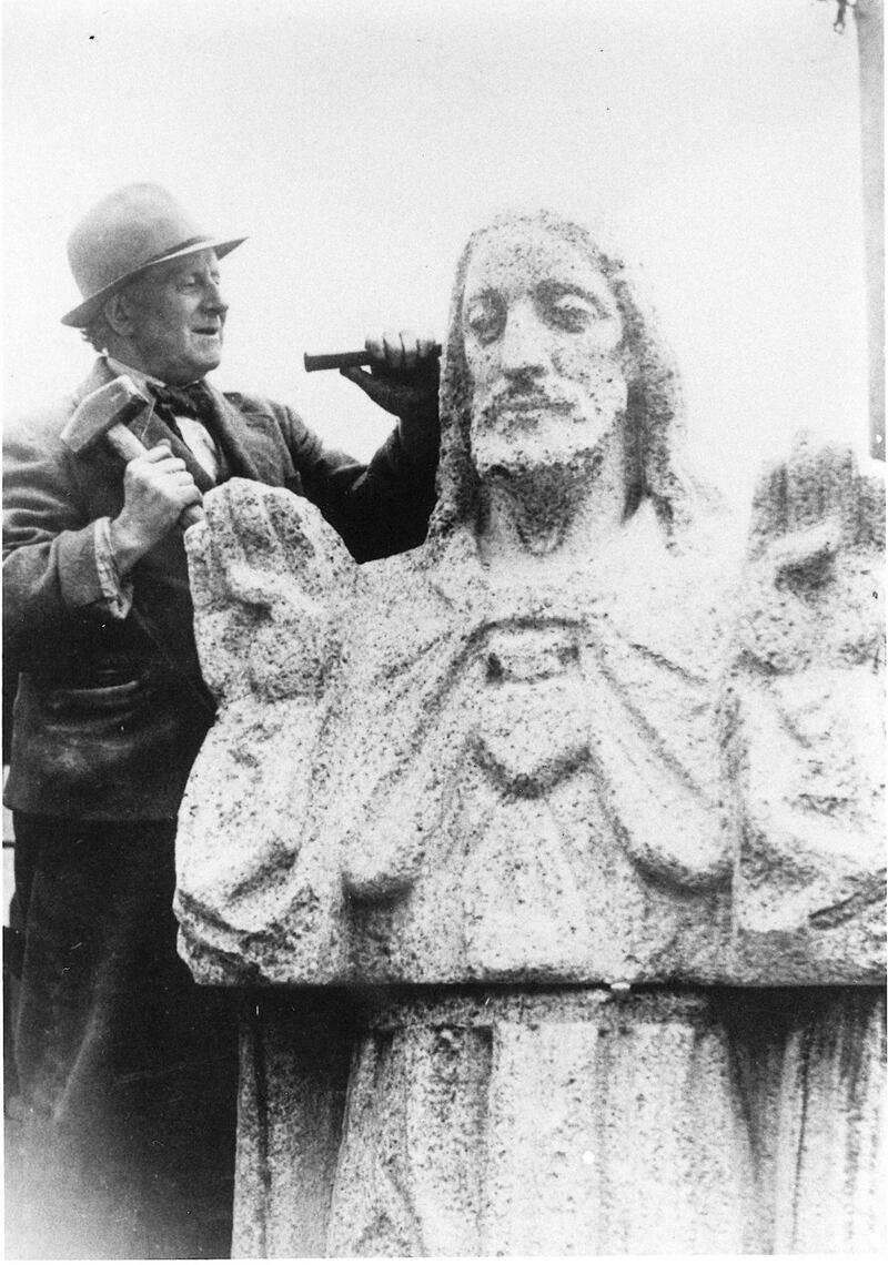 Power works on one of his many religious figures