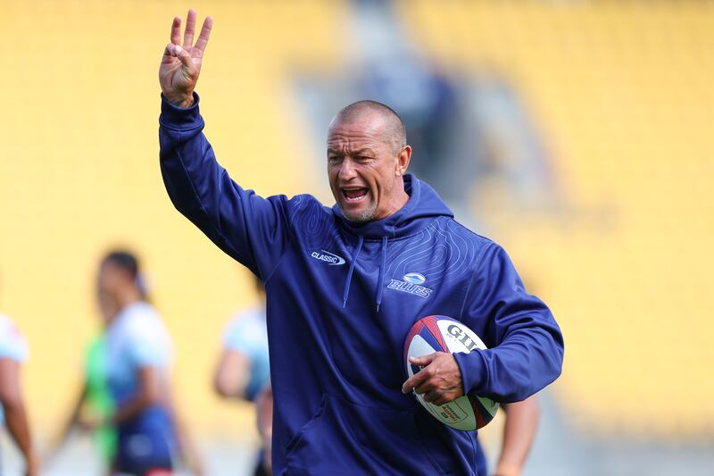 Spencer talks to players during the round one Super Rugby Aupiki match between Hurricanes Poua and Blues at Sky Stadium in Wellington, New Zealand, in March. Photograph: Hagen Hopkins/Getty Images