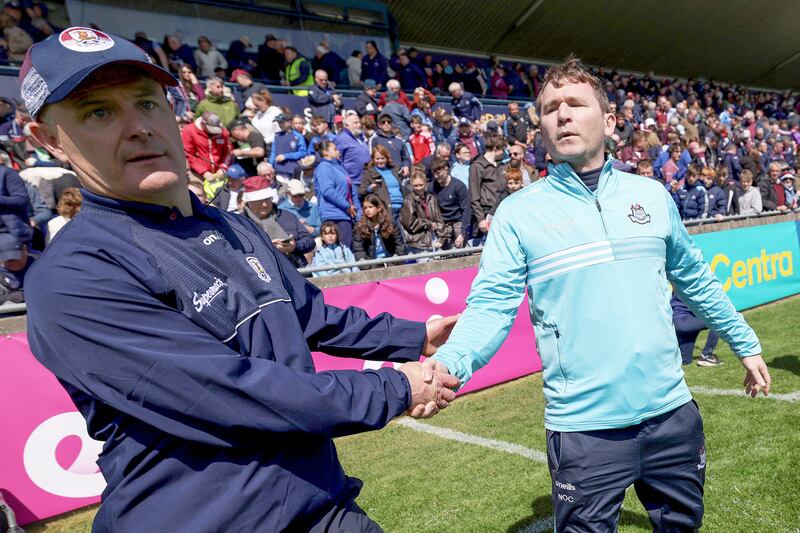 Galway manager Micheál Donoghue and Dublin manager Niall Ó Ceallacháin shake hands after the game. Photograph: Laszlo Geczo/Inpho