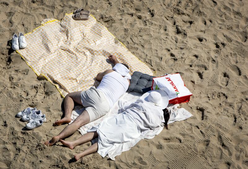 Beachgoers in Scheveningen, in the Netherlands. Photograph: Koen Van Weel/ANP/AFP/Getty
