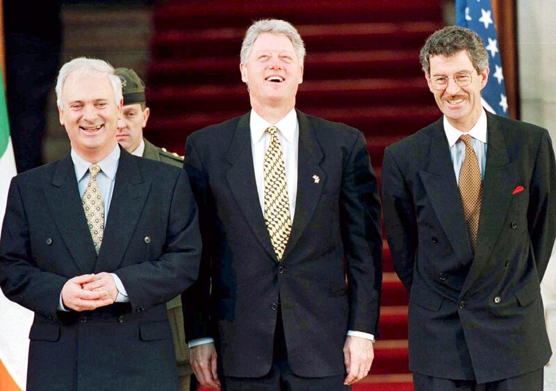 Then US president Bill Clinton (centre) with then taoiseach John Bruton (left) and then minister for foreign affairs Dick Spring outside Government Buildings in Dublin in December 1995. Photograph: Russell Boyce/Reuters
