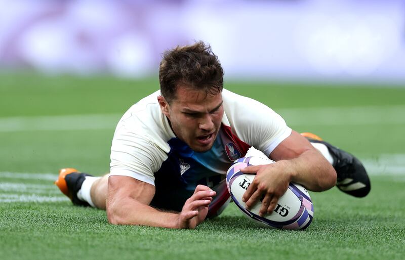France's Antoine Dupont scores a try. Photograph: Cameron Spencer/Getty