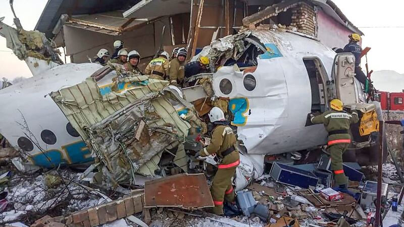 Rescuers working at the site of a passenger plane crash outside Almaty. Photograph: AFP PHOTO/Kazakhstan’s emergencies committee