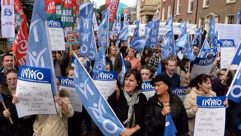 Members of the Irish Nurses and Midwives Organisation protesting over conditions of employment outside Leinster House two years ago. File photograph: Eric Luke/The Irish Times