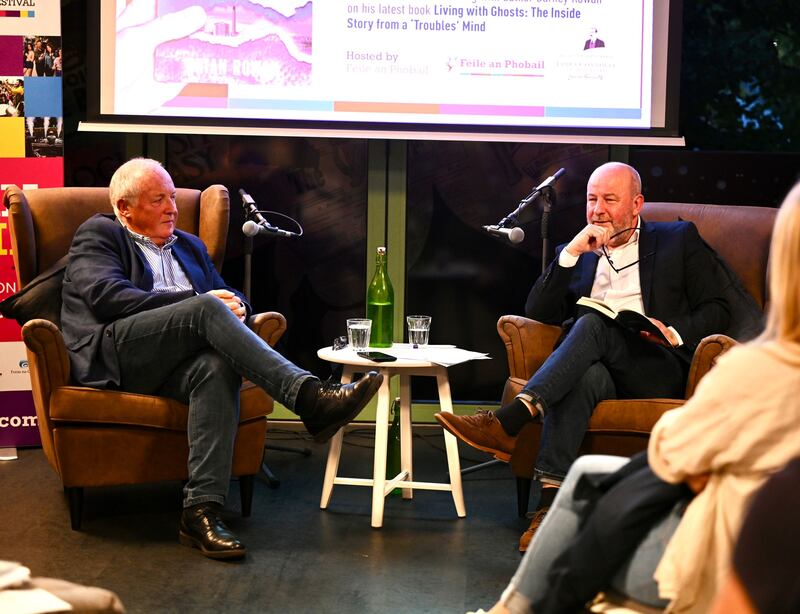 Brian Rowan (right) pictured with former colleague Mervyn Jess at Féile an Phobail in west Belfast recently. Photograph: MT Hurson