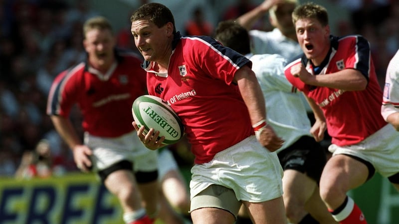 Jason Holland makes a break against Toulouse on a famous day for Munster. Photograph: Inpho