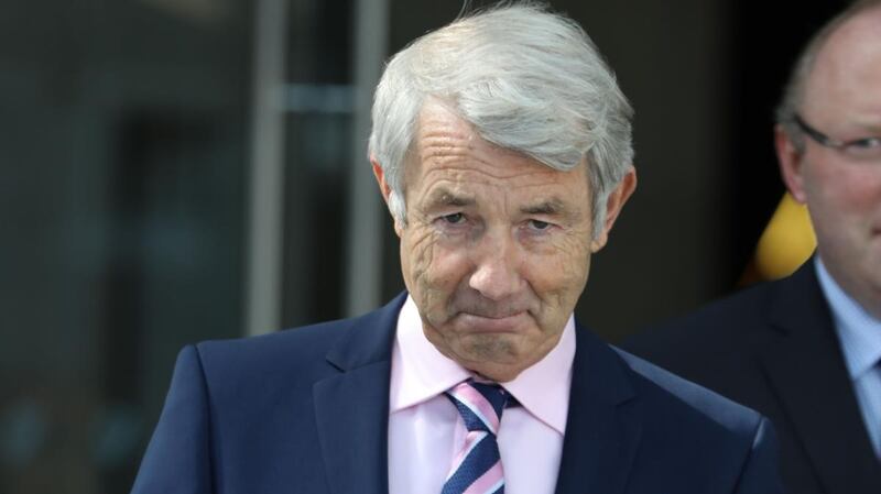 Michael Lowry emerges from court in June with a “fantastic result” after “22 years of turmoil”. Photograph: Collins Courts