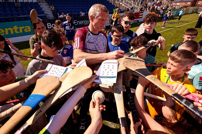 Galway Manager Henry Shefflin signs hurls for fans after the game. Photograph: Ben Brady/Inpho