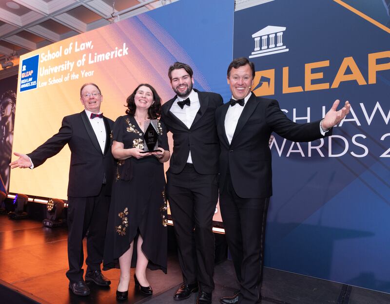 Richard Hammond, solicitor and partner at Hammond Good LLP and chair of the judging panel of the Leap Irish Law Awards; Lucy Ann Buckley, head of the School of Law at University of Limerick; Alex Casey, research assistant; and Anton Savage, MC of the night. Photograph: Paul Sherwood