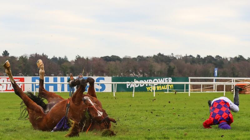 Simon Torrenson parts company with Killdunne at the last fence in the opening race of the day at Leopardstown. Photo: James Crombie/Inpho