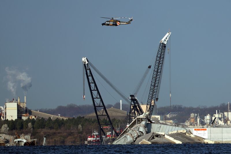  A crane works on the debris of the Francis Scott Key Bridge. Photograph:  Kevin Dietsch/Getty Images