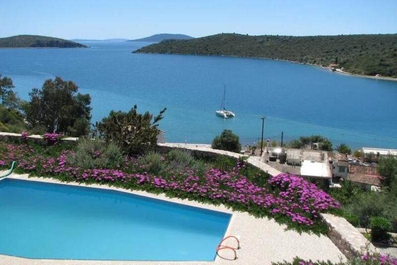 Greece: this three-storey house with pool has sweeping views of the Aegean, 150m away