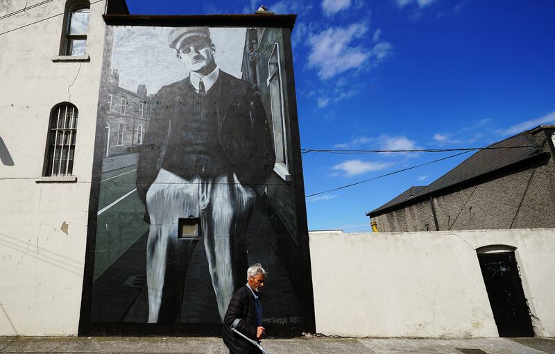 A man walks past a mural of James Joyce by Shane Sutton Art on Richmond Street in Dublin ahead of Bloomsday in 2022. Photograph: Brian Lawless/PA