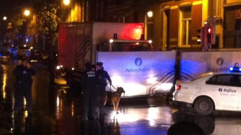 Police  in Molenbeek, Brussels after an arrest was made in the wake of the Paris attacks in France. Photograph: Suzanne Lynch/The Irish Times