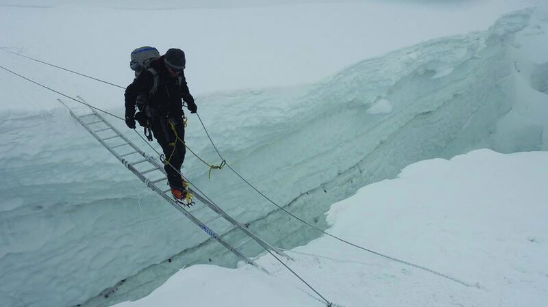 Trying to be careful crossing ladders, we were all very tired on the way down towards the icefall.