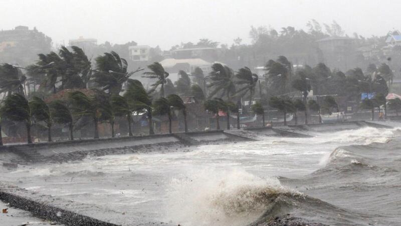 Strong winds and waves brought by Typhoon Hagupit pound the seawall in Legazpi City in Luzon, Philippines. Photograph: Reuters
