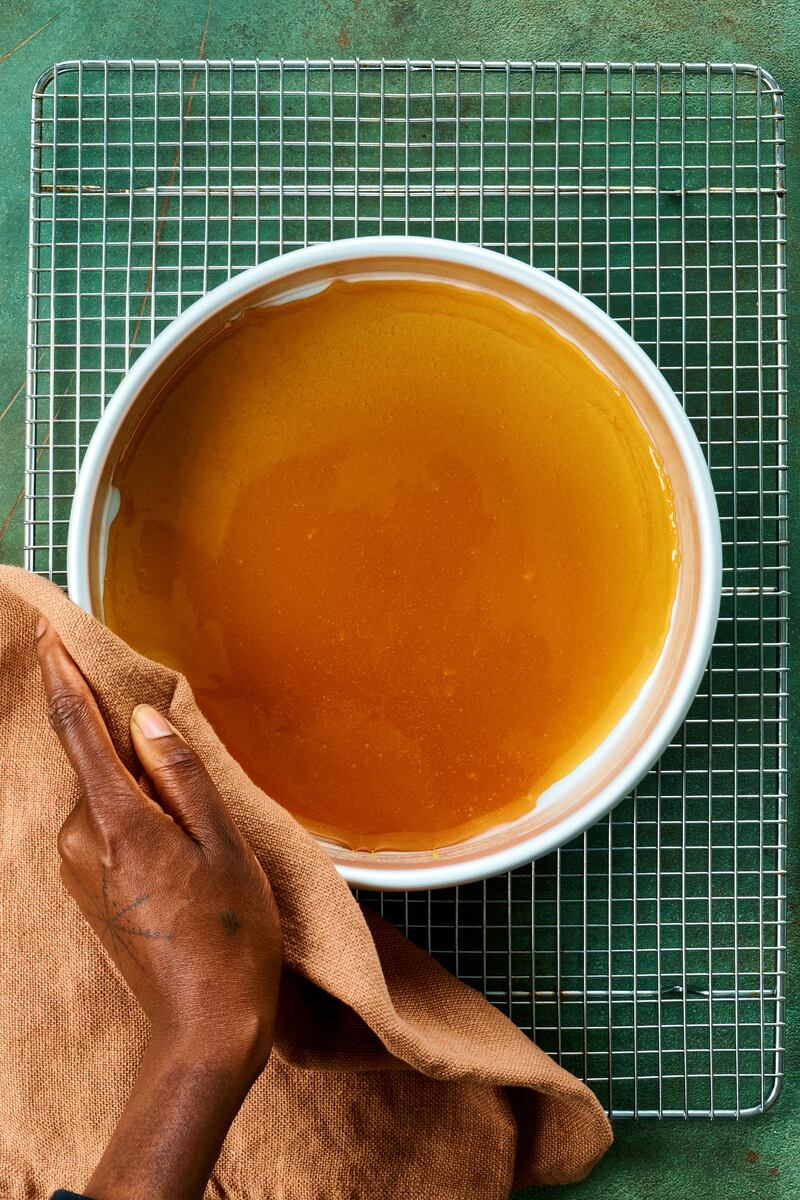 The syrup takes only seconds to transform from a light golden to a dark amber hue. Photograph: Kelly Marshall/The New York Times