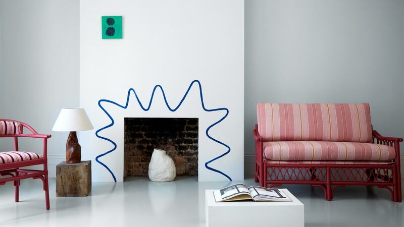 A surrounding squiggle is a fun way to change up the space. This one  features fabrics by UK-based A Rum Fellow