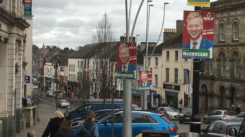 Call to vote: competing election posters in Omagh. Photograph: Peter Murtagh