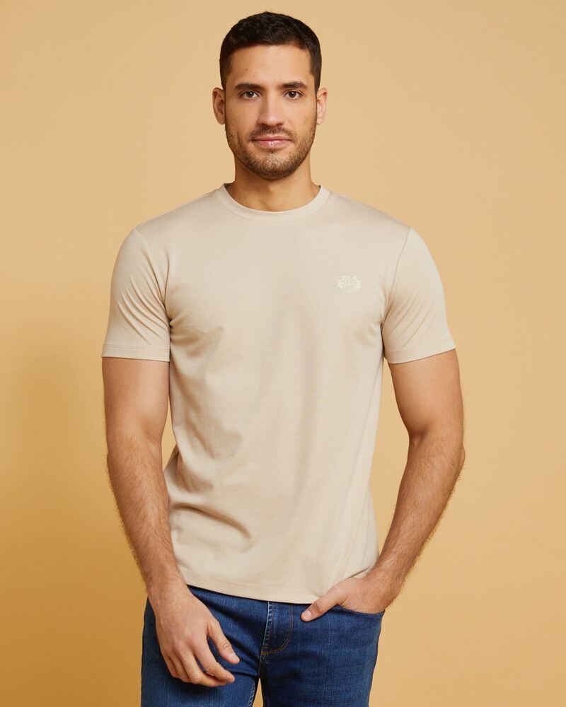 Stone crew neck T-shirt, €15, and denims, €40, from Paul Costelloe Living collection at Dunnes Stores